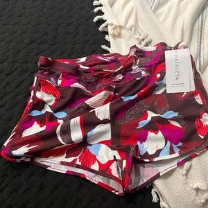 Just in time for summer fun!  NWT Athletic Surge swim shorts